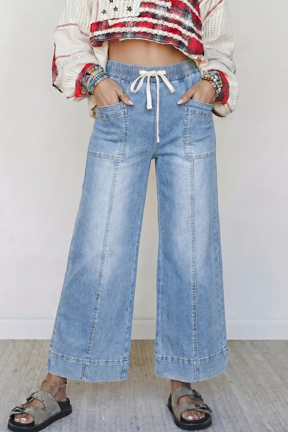 light blue wide-leg jeans with elastic waist and N/A