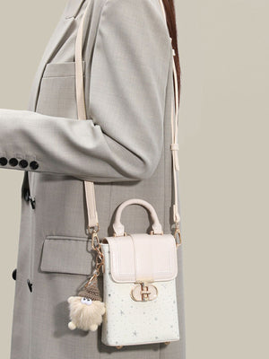crossbody bag in ivory featuring mini and boxy fit