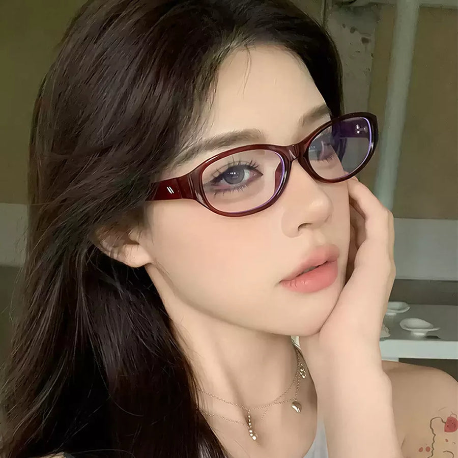 PC Frame material: Polycarbonate Lens material: Polycarbonate Temple material: P sunglasses in Red with oval silhouette