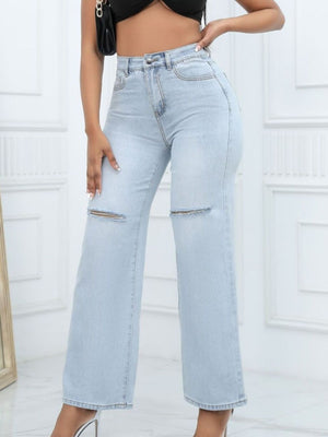 wide-leg jeans in light blue featuring distressed and wide-leg fit