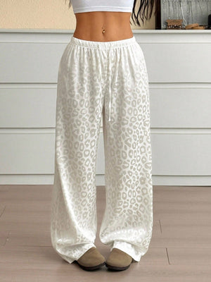 Wide leg leopard print satin pants with drawstring waist