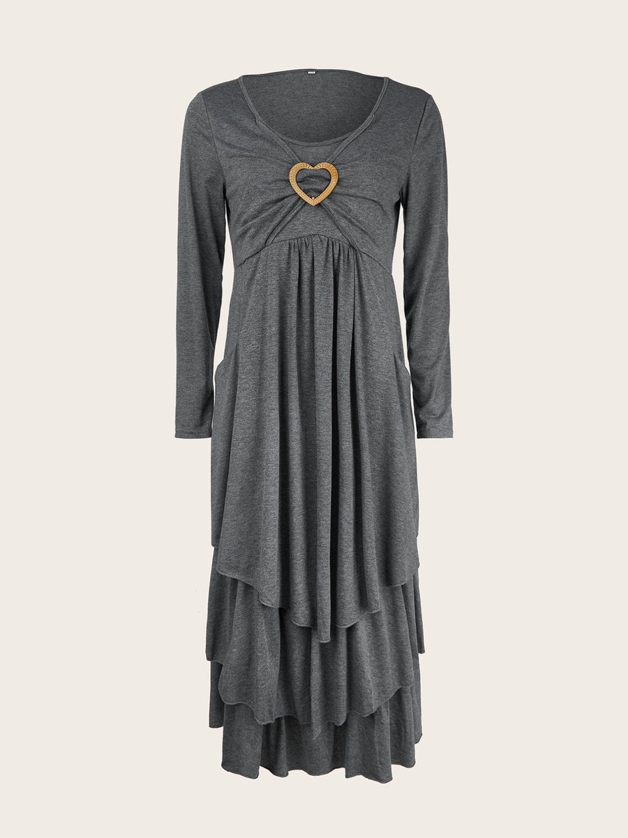 Dark gray tiered midi dress with long sleeves and a heart detail at the neckline.