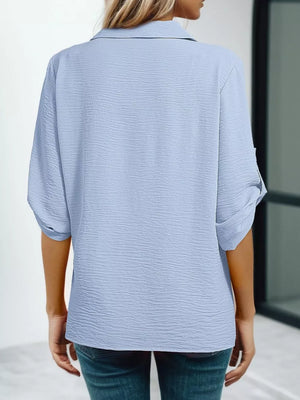 Sky blue crinkled texture Johnny collar shirt with rolled sleeves.