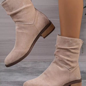 Khaki suede ankle boots with ruched shaft and side zipper detail.