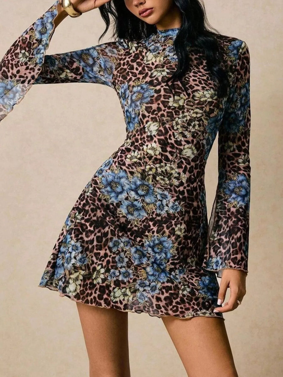 Mini dress with mock neck, bell sleeves, and floral leopard print.