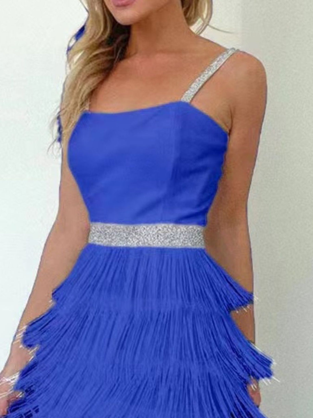 Blue cami mini dress with fringe trim, sequin straps, and sequin waistband.