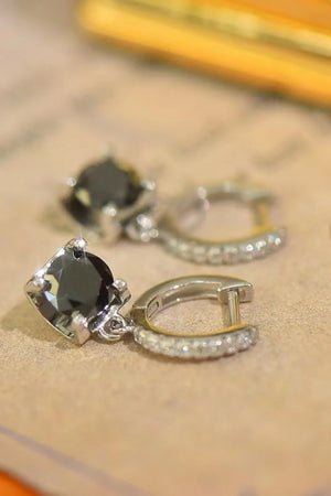 Black square stone hoop earrings with pavé crystal details.