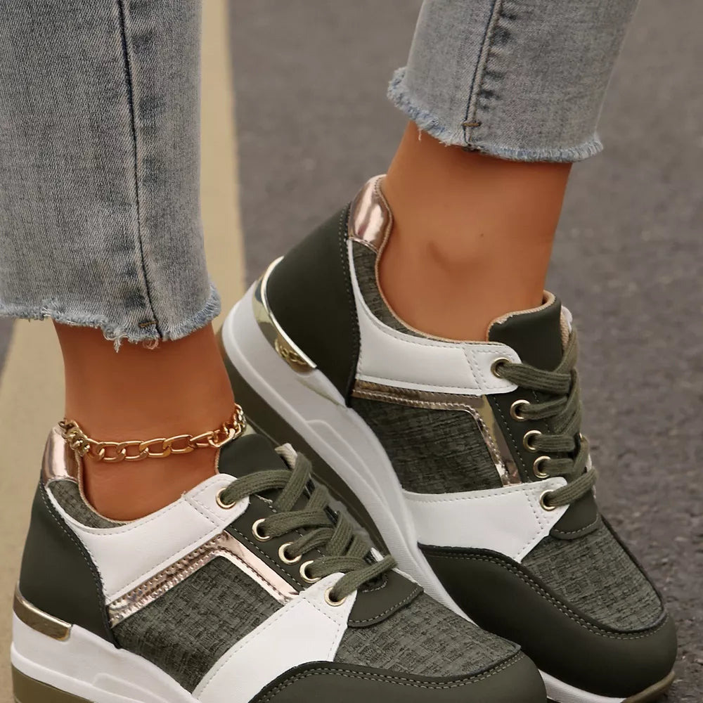 Textured lace-up sneakers in army green with white and metallic accents and a chunky sole.