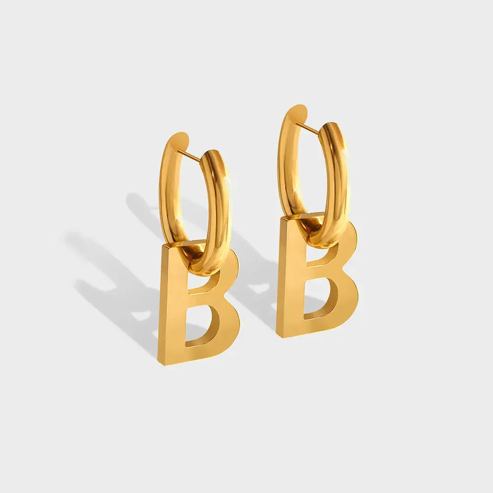 Gold titanium statement hoop earrings with bold letter B charms