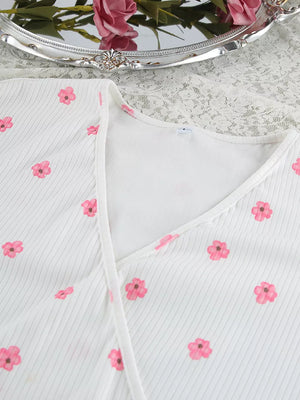 pink wrap dress with tie and ditsy floral