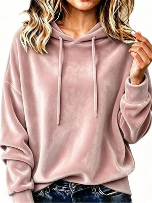 pullover hoodie in blush pink featuring drawstring and relaxed fit