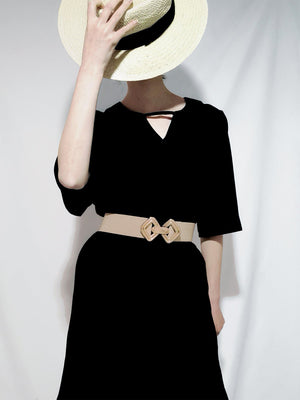 Elasticated waist belt in Khaki with a geometric gold buckle detail.