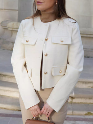 White cropped tweed button-up jacket with gold buttons and pocket details