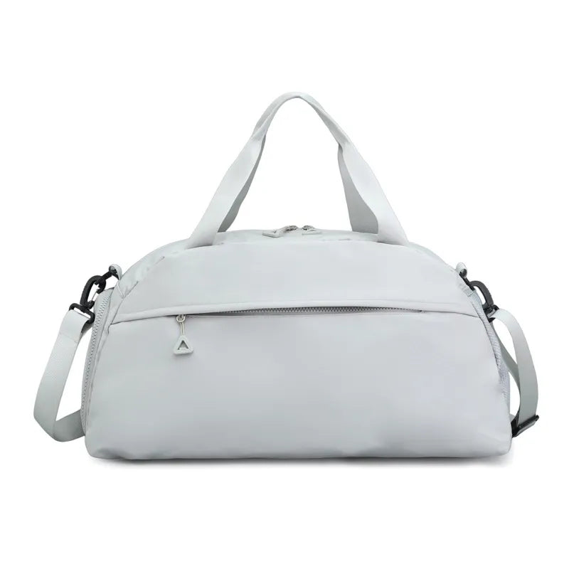 Light Gray duffel bag with top handles and detachable shoulder strap, front zip pocket.