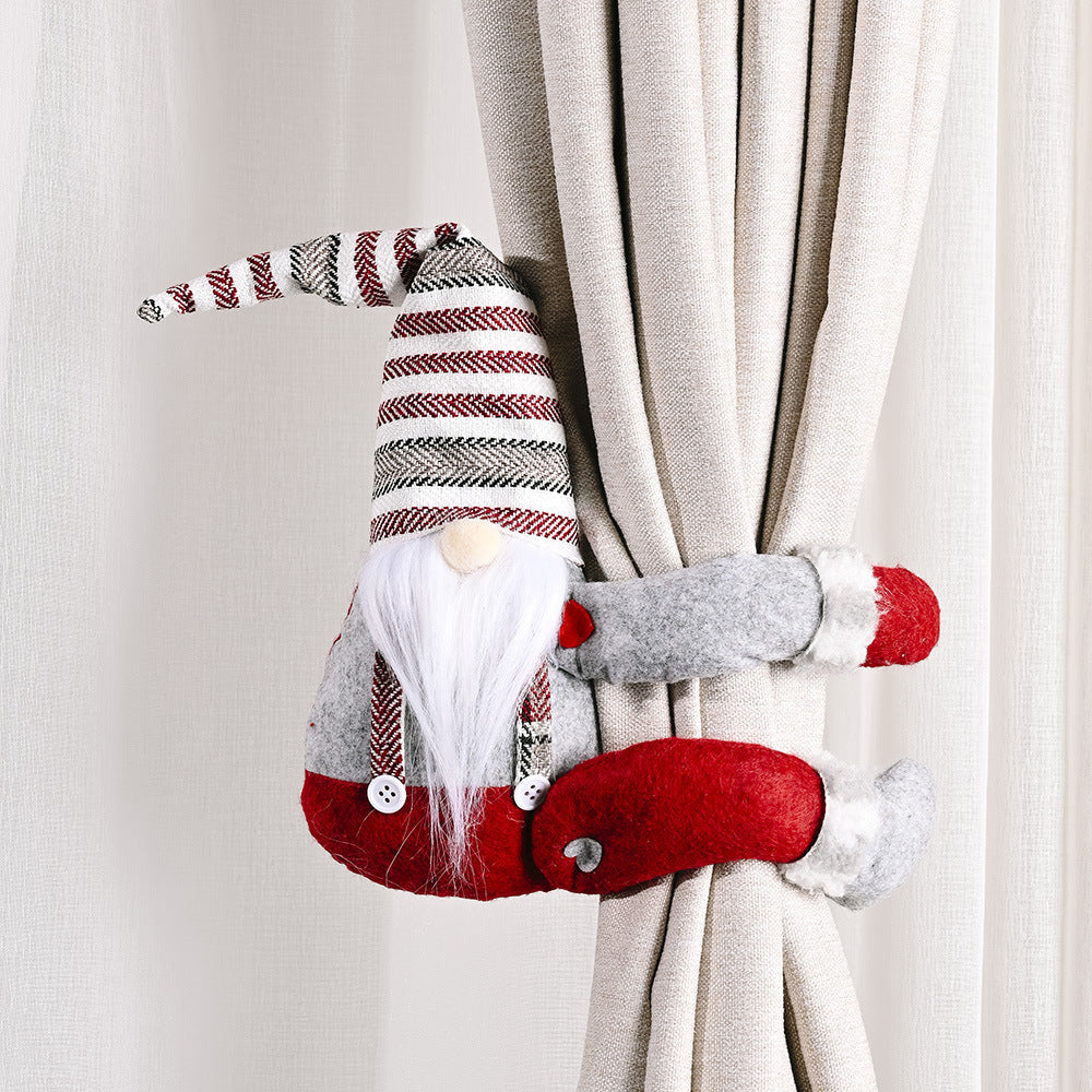 Whimsical gnome curtain tie-backs in red and gray with striped hat and white beard.