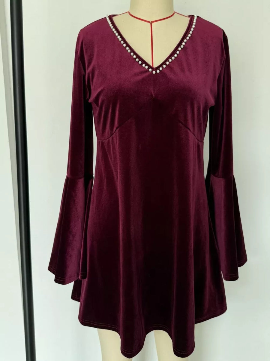 romantic mini dress in taupe with deep v-neck
