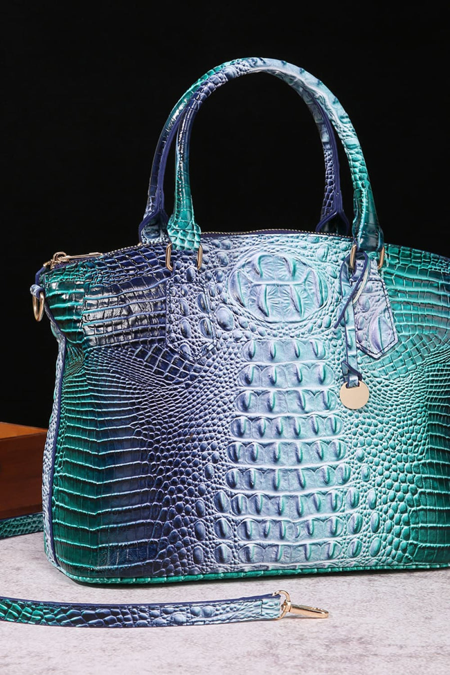 Exotic Crocodile Satchel bag in a blue/green gradient with embossed texture and gold hardware.