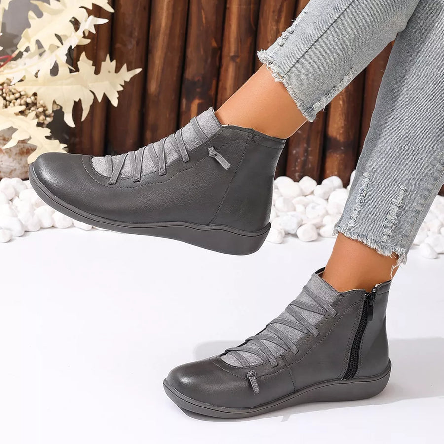 Black ankle boots with ankle-length and lace-up, zip-front