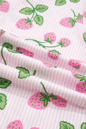 Pink and white striped pajama fabric with a whimsical strawberry print.
