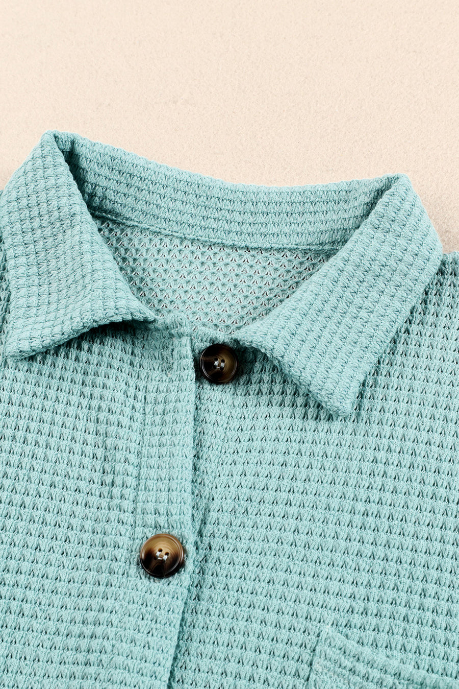 Light Green waffle knit button-down shirt jacket with brown buttons and collar detail.