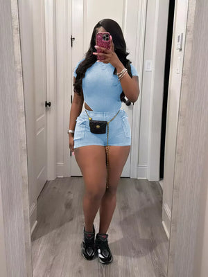 Sky blue ribbed crop top and pocket shorts set with a gold chain belt.