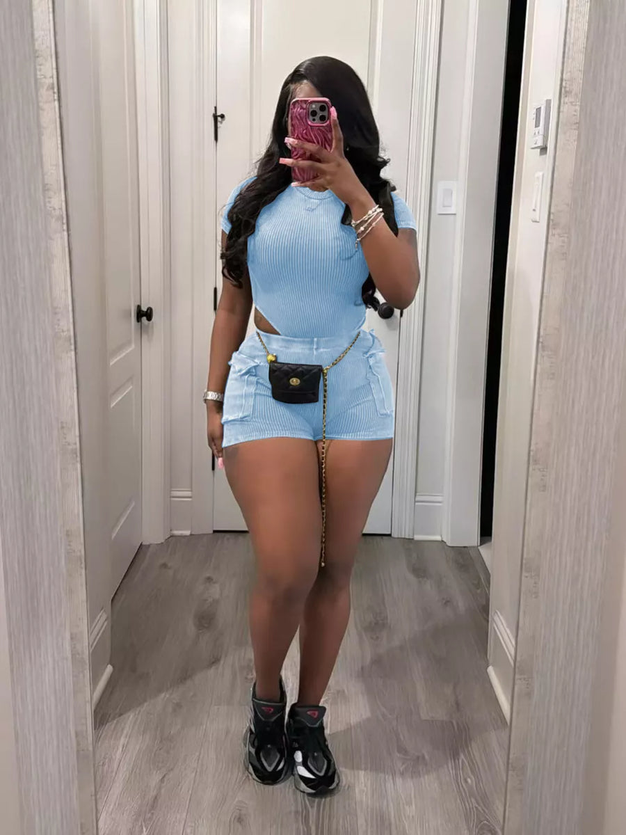 Sky blue ribbed crop top and pocket shorts set with a gold chain belt.