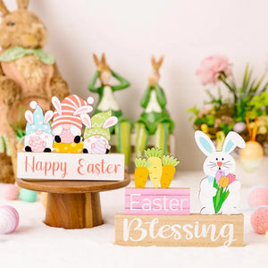 Easter wooden gnome trio display with Happy Easter text, and a bunny holding tulips.