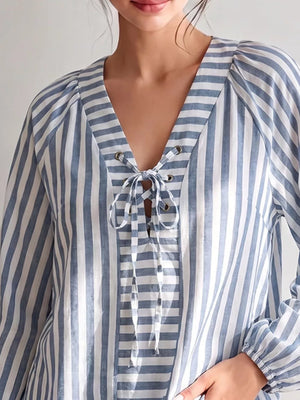 100% polyester Care instructions: Machine wash cold blouse in Dusty Blue with relaxed silhouette