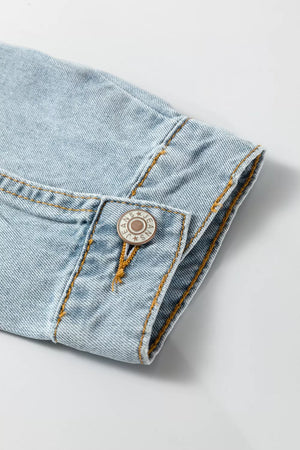 Light wash denim trucker jacket with button detail and contrast stitching