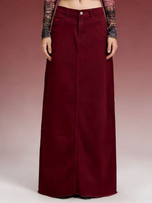 Burgundy cotton denim maxi skirt with raw hem and button closure