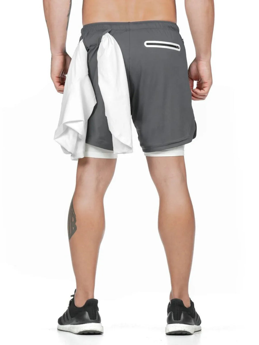Gray layered performance shorts with white built-in liner and towel loop detail.