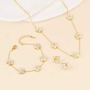 ivory jewelry set featuring 18K gold-plated and floral