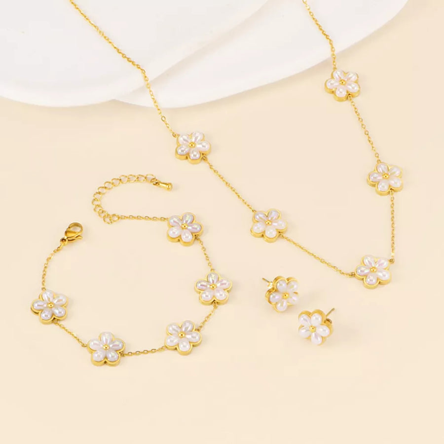 ivory jewelry set featuring 18K gold-plated and floral