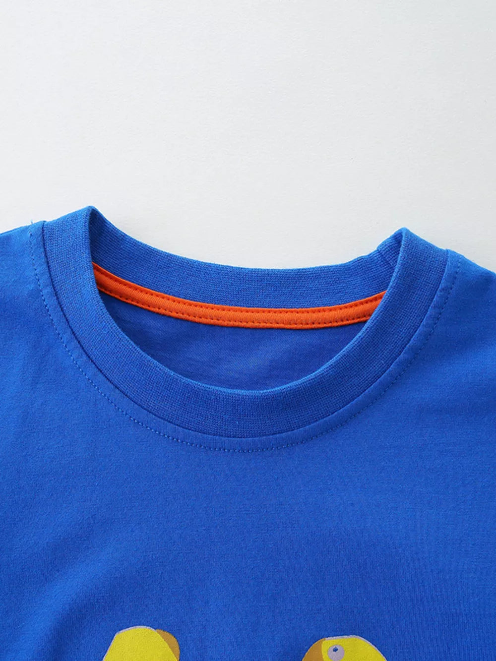 Blue t-shirt with orange trim on crew neck