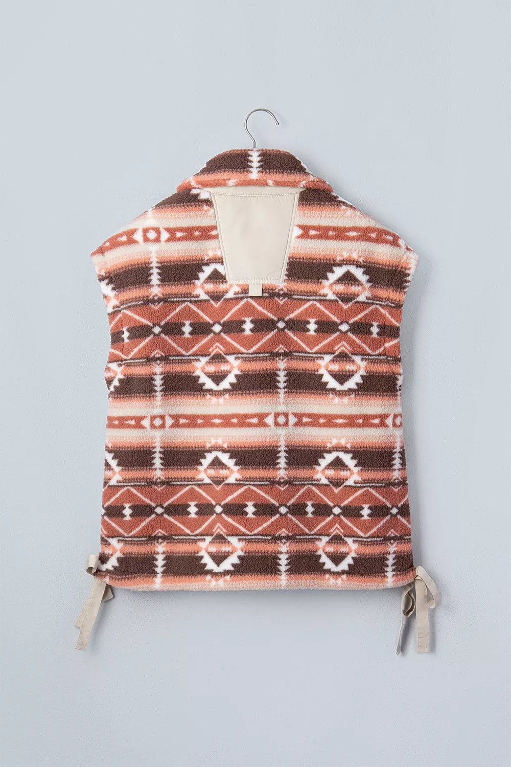 vest in rust with hooded and hip-length