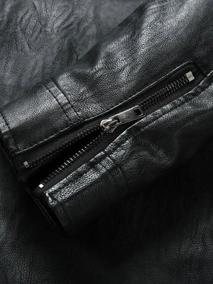 Black plus-size moto jacket with zip detail and textured faux leather.