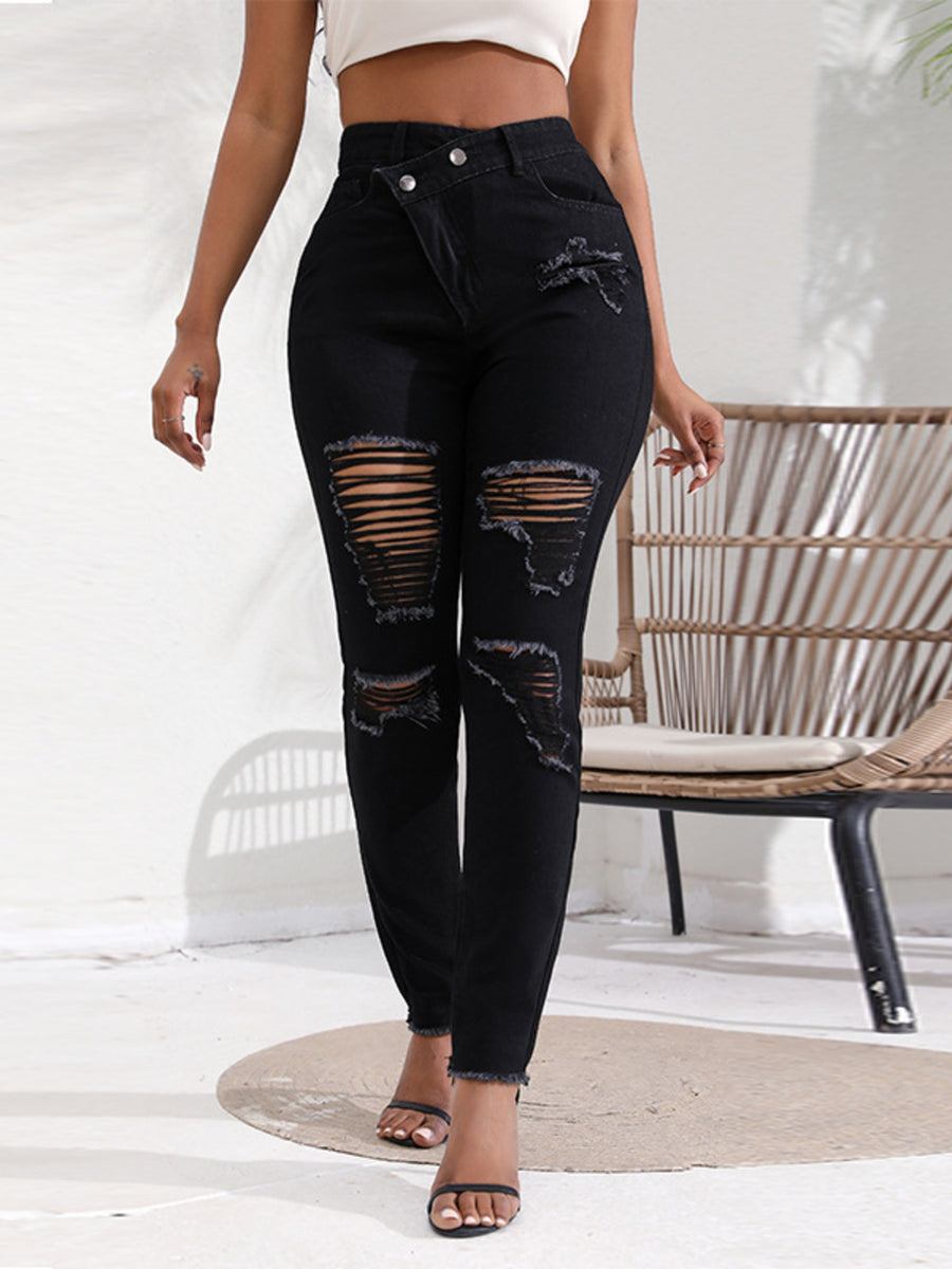 jeans in black featuring distressed and slim fit