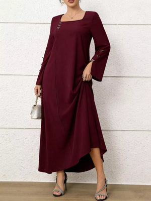 Maroon maxi dress with square neck, flare sleeves, and decorative buttons.