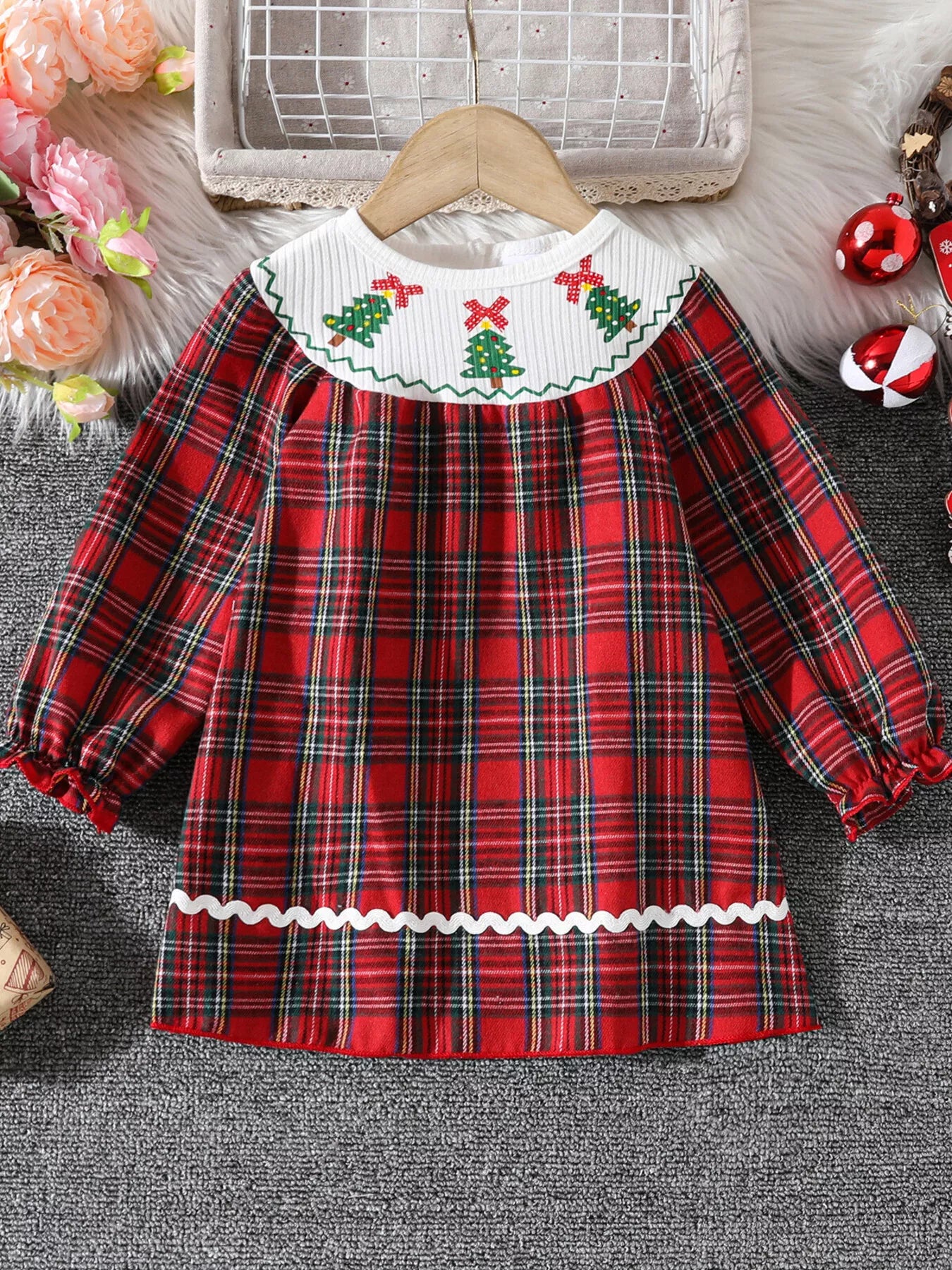 Baby girls red plaid long sleeve dress with embroidered Christmas trees on collar.
