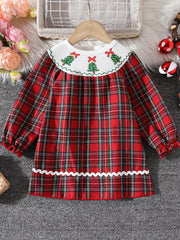 Baby girls red plaid long sleeve dress with embroidered Christmas trees on collar.
