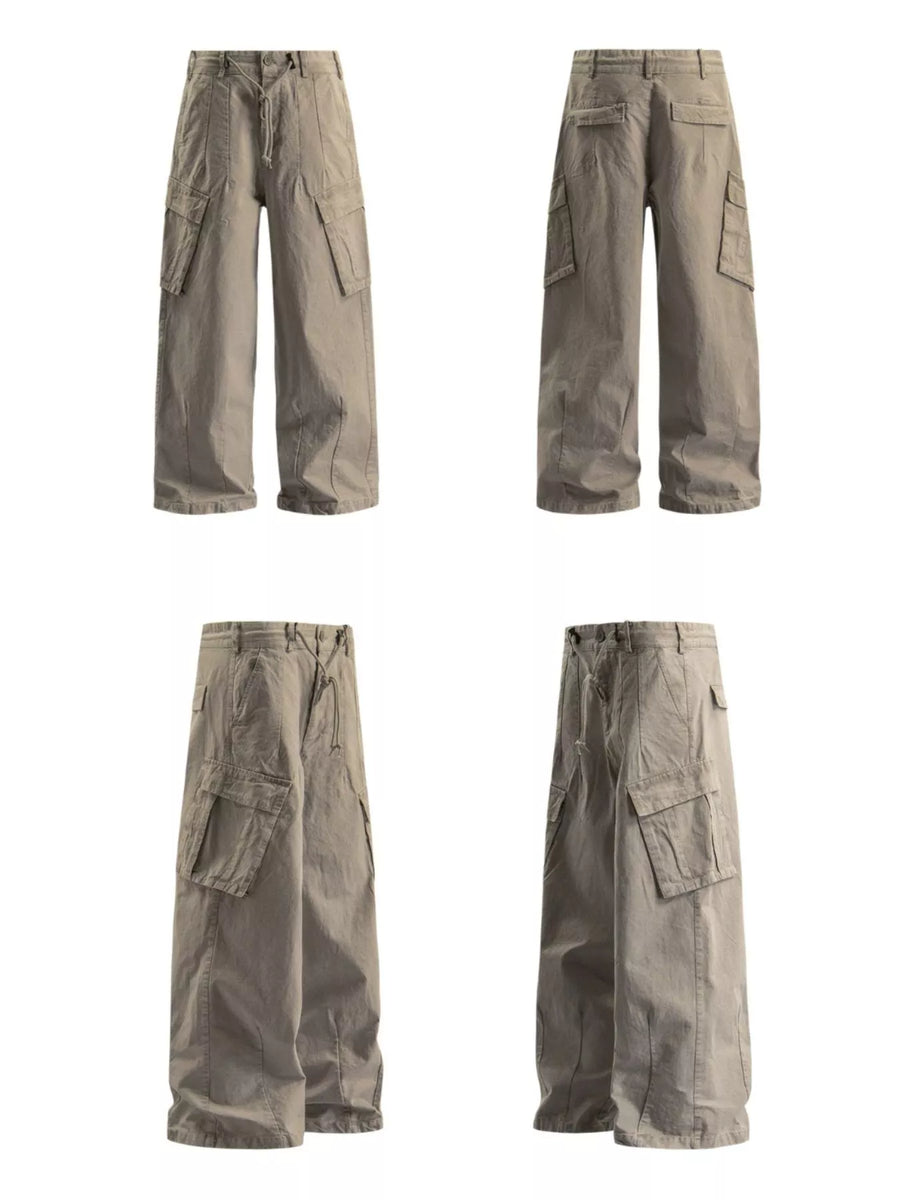 Relaxed fit khaki cargo pants with drawstring waist and multiple pockets.