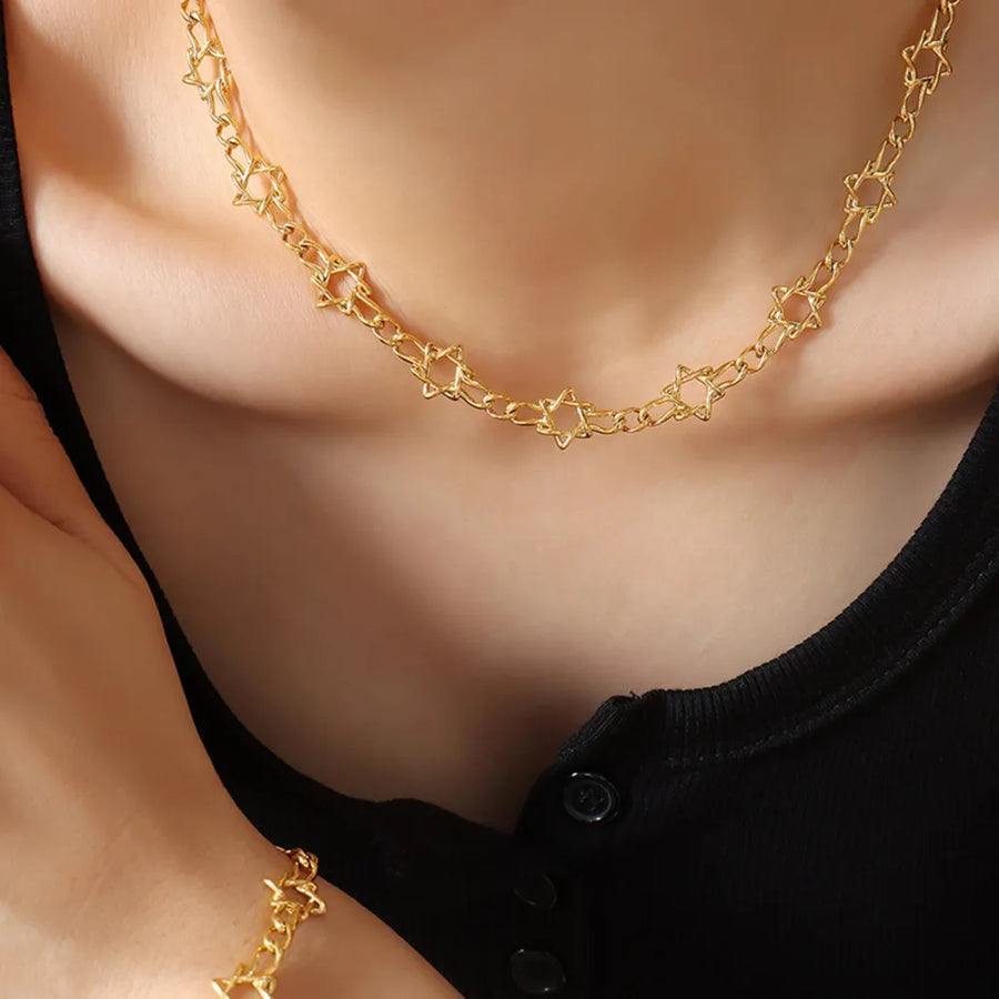Gold brass heart link chain necklace with star details