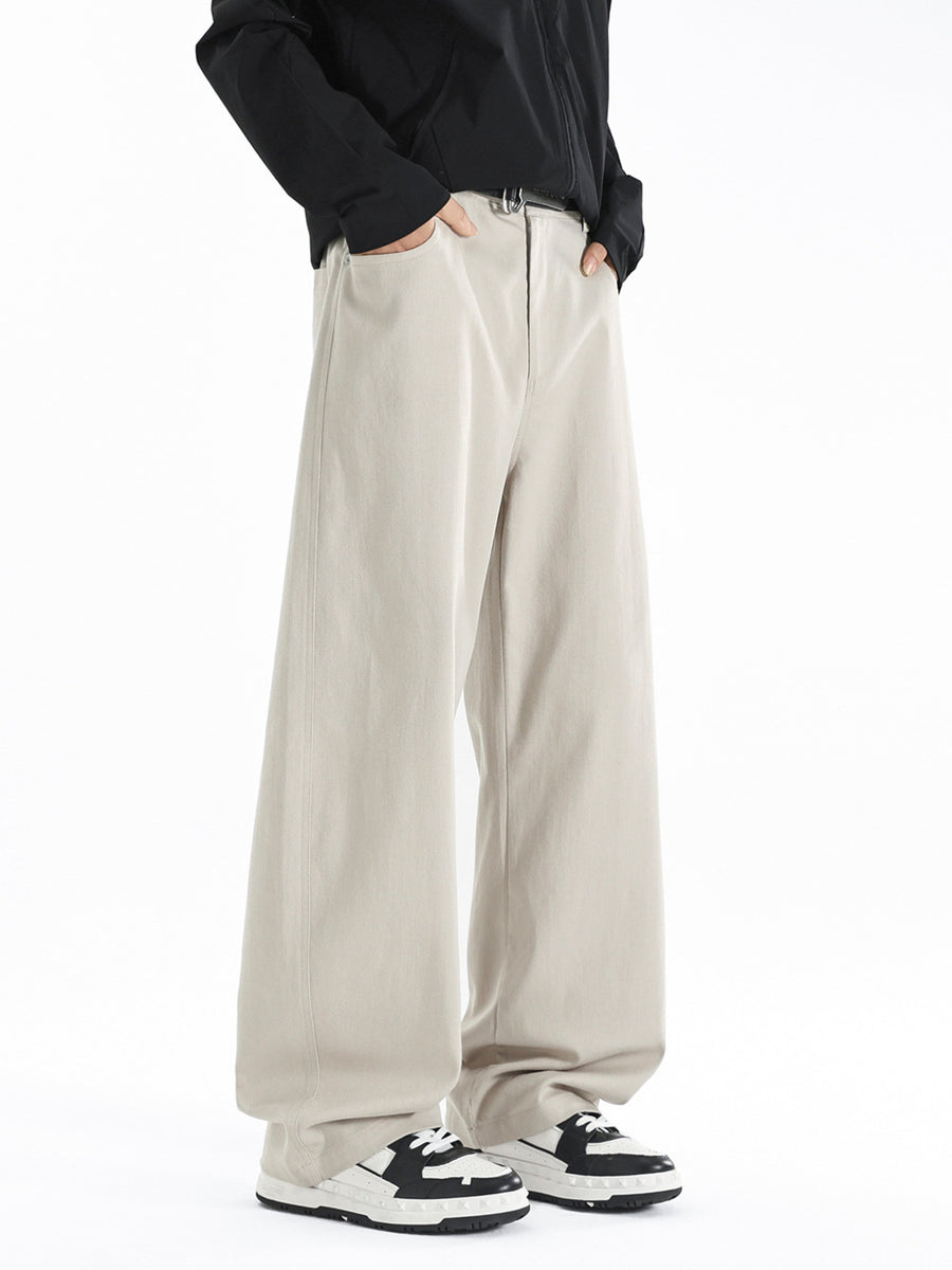 Men's beige wide-leg casual pants with a relaxed fit and side pockets.