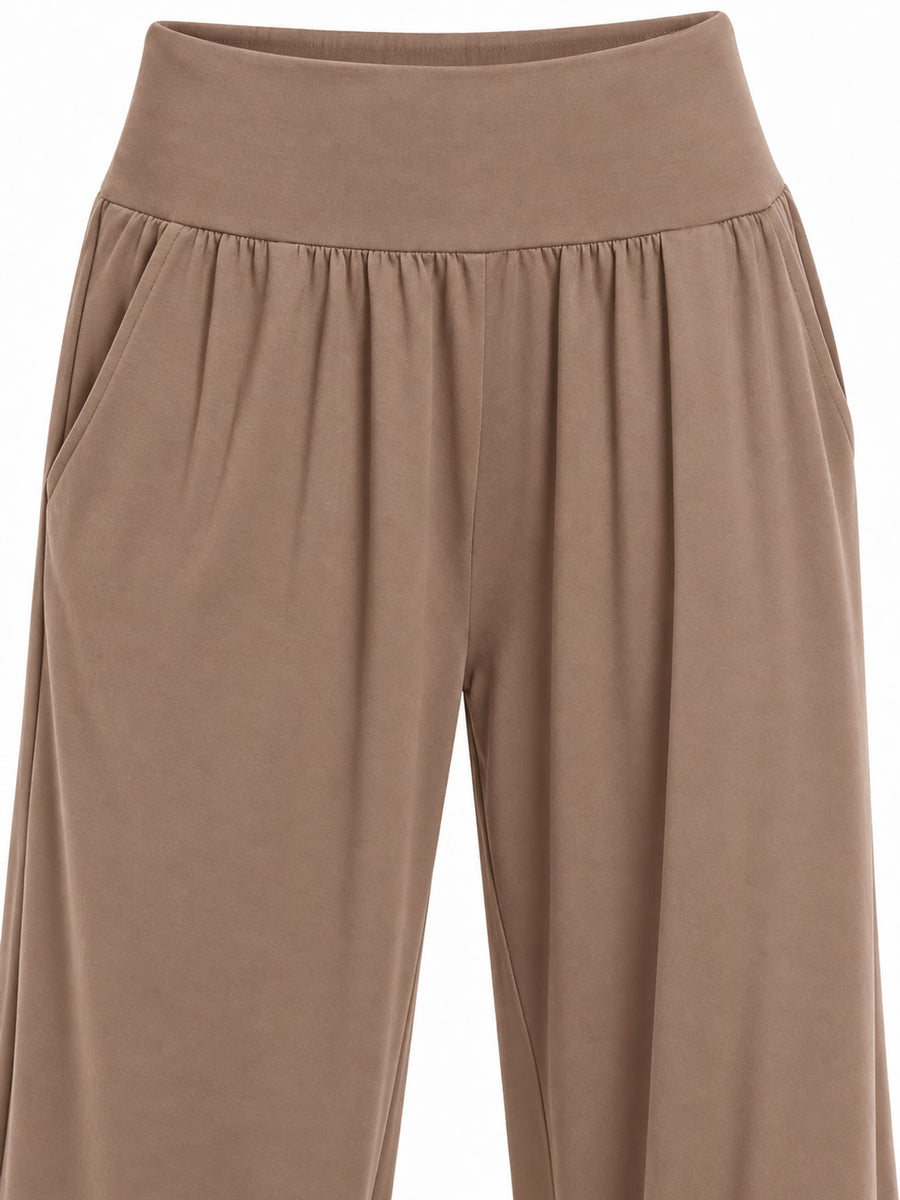 Polyester and spandex blend wide-leg pants in black with relaxed silhouette