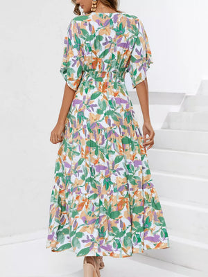Lemon Leaf Print V-neck Midi Dress in Black Forest with flutter sleeves and tiered skirt.