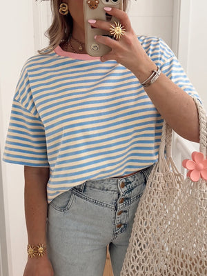 Striped round-neck t-shirt in light blue and cream cotton with pink trim.