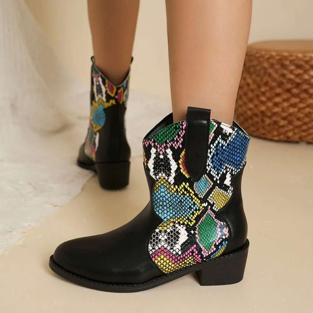 Python print western booties in snakeskin with colorful accents and a block heel.