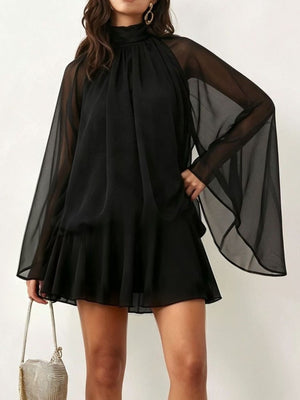 mini dress in black featuring ruffled and flared fit