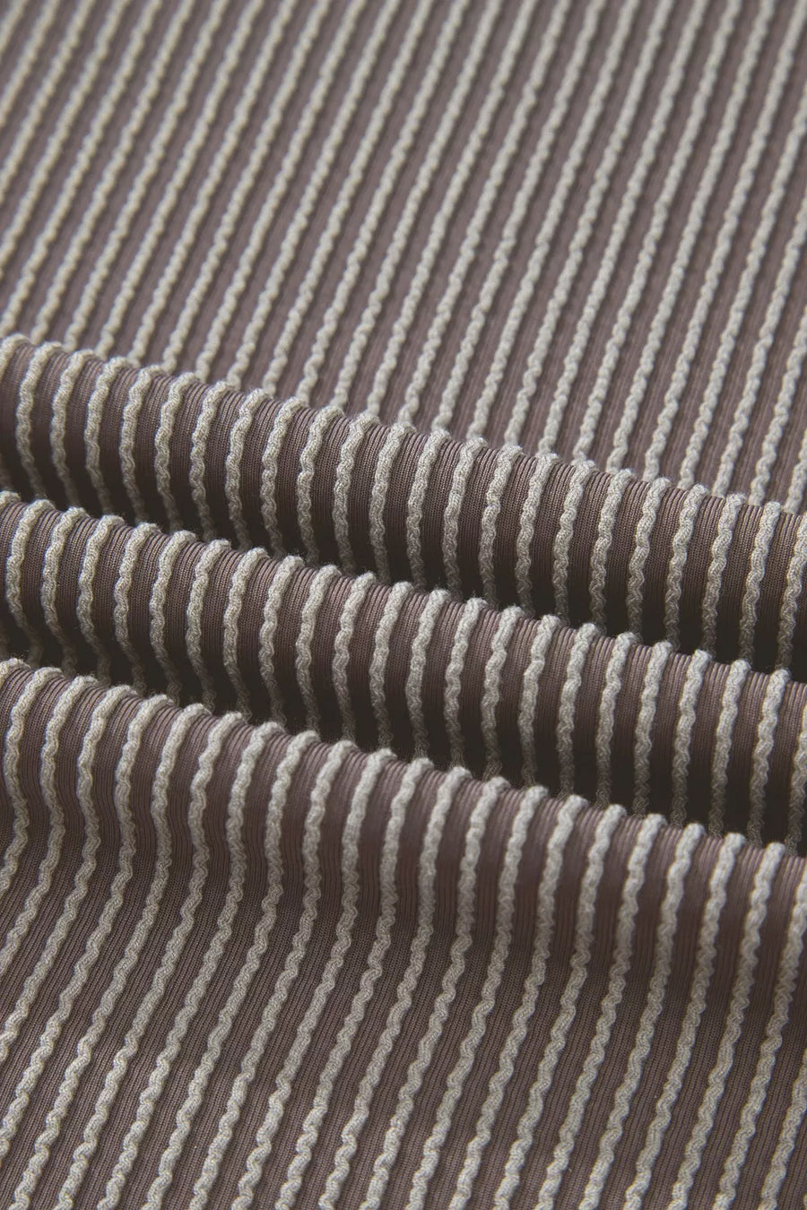 Brown ribbed knit two-piece set with cream stripe detail