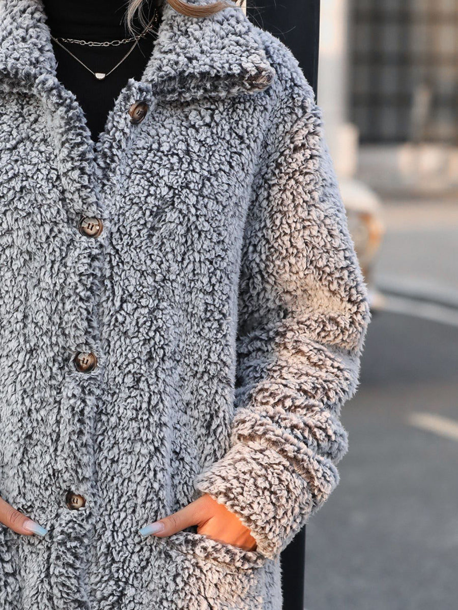 Teddy bear textured button-down coat in grey with brown buttons.